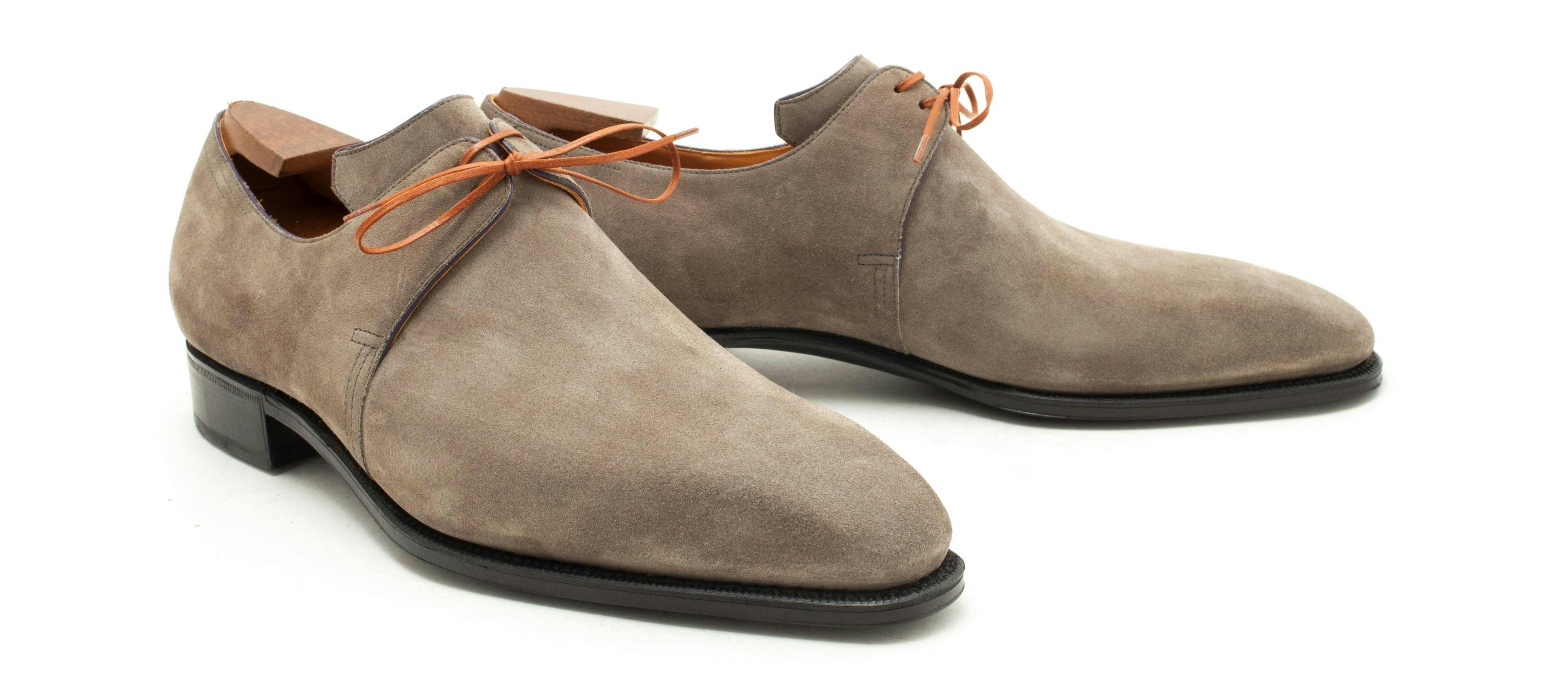 Front view of a Corthay Arca in grey suede.