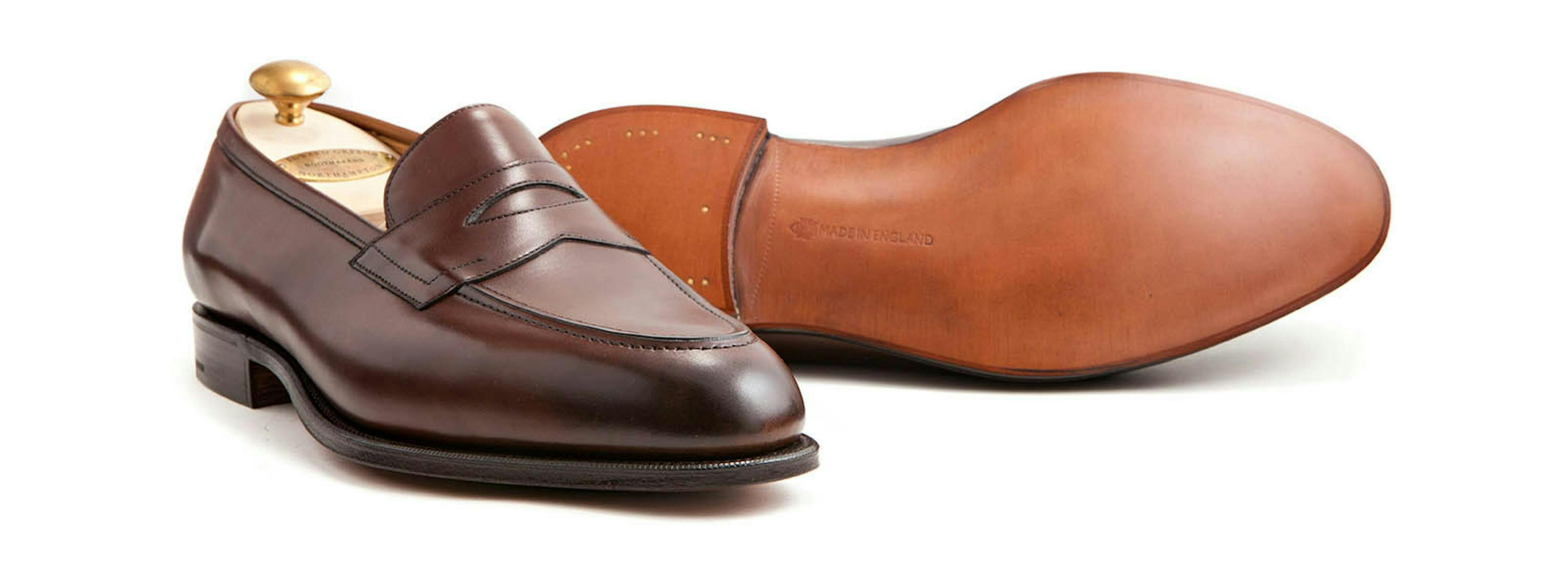An Edward Green Piccadilly in dark oak calfskin, with a view of its single leather soles.