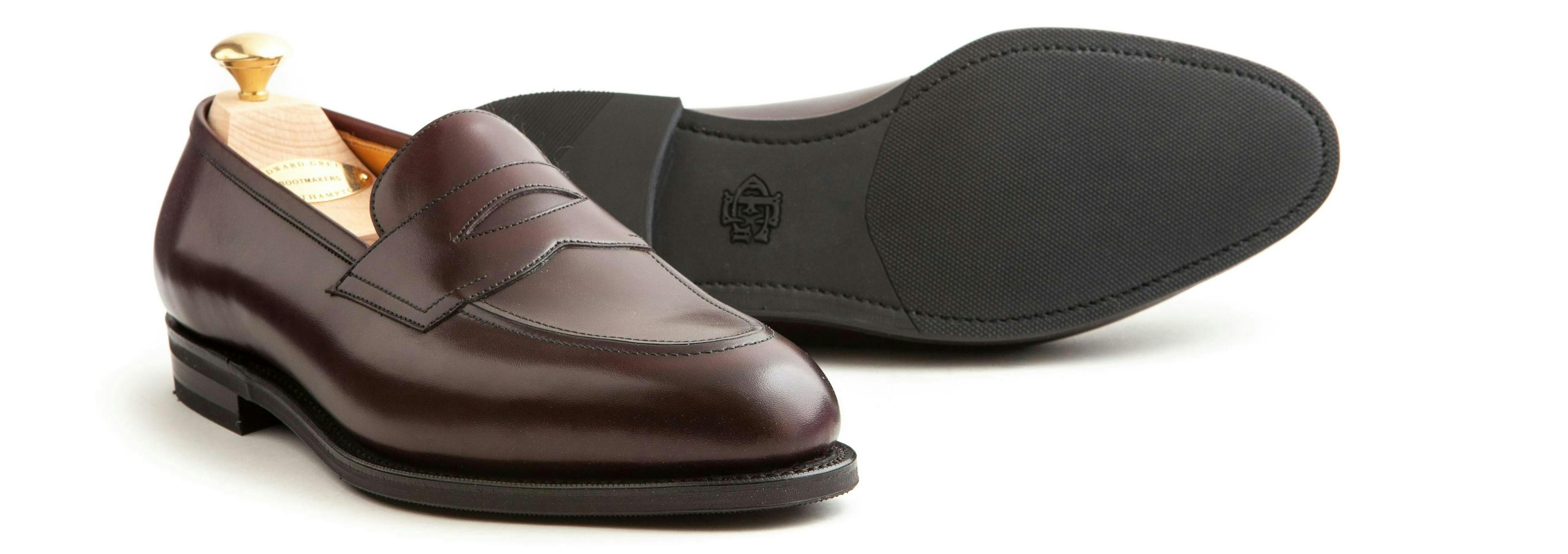An Edward Green Piccadilly in burgundy calfskin, with a view of its R1 rubber soles.