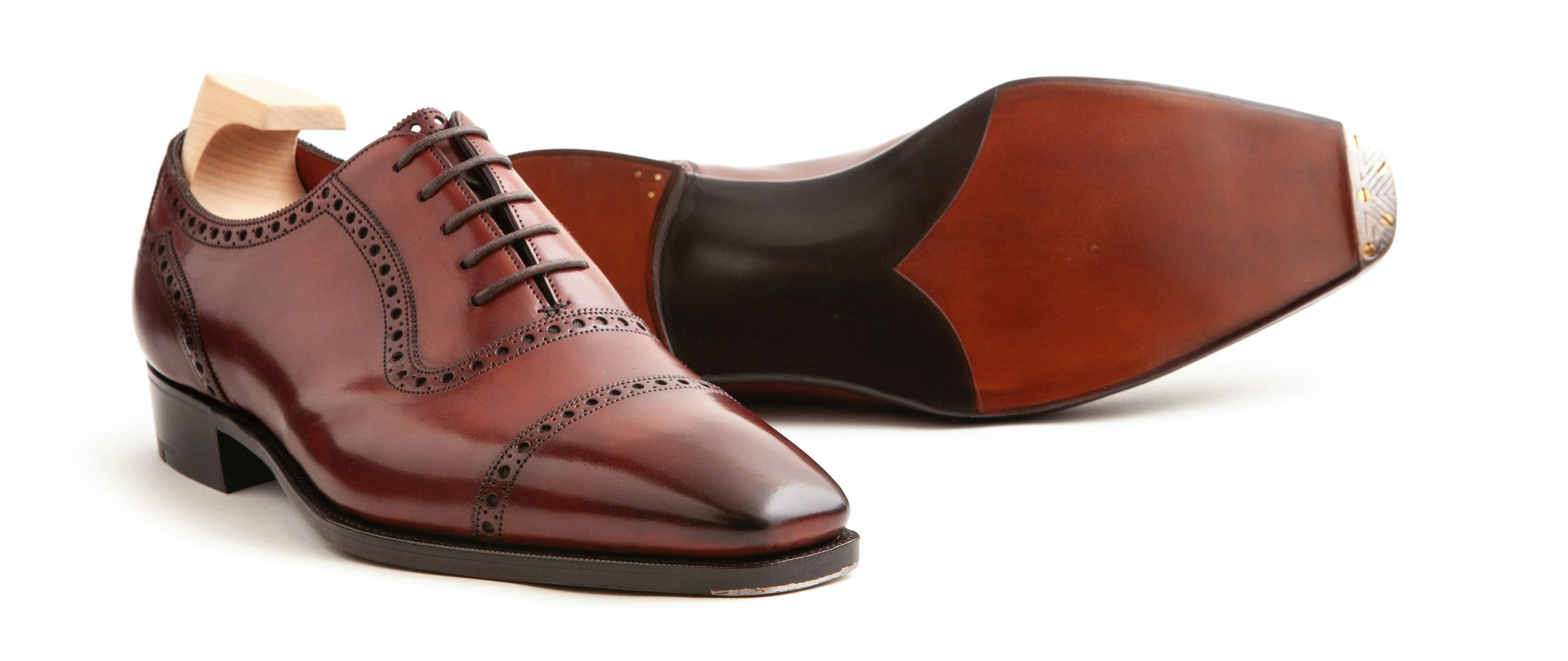 Gaziano & Girling St. James in vintage cherry calfskin, with a view of its single leather soles and sunken metal toe plates.